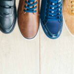 Leather shoes on wooden background