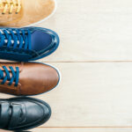 Leather shoes on wooden background