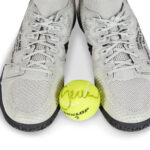 SERENA WILLIAMS GAME WORN COURT FLARE 2 WHITE BY VIRGIL ABLOH WITH SERENA WILLIAMS SIGNED TENNIS BALL Estimate $8,000-10,000